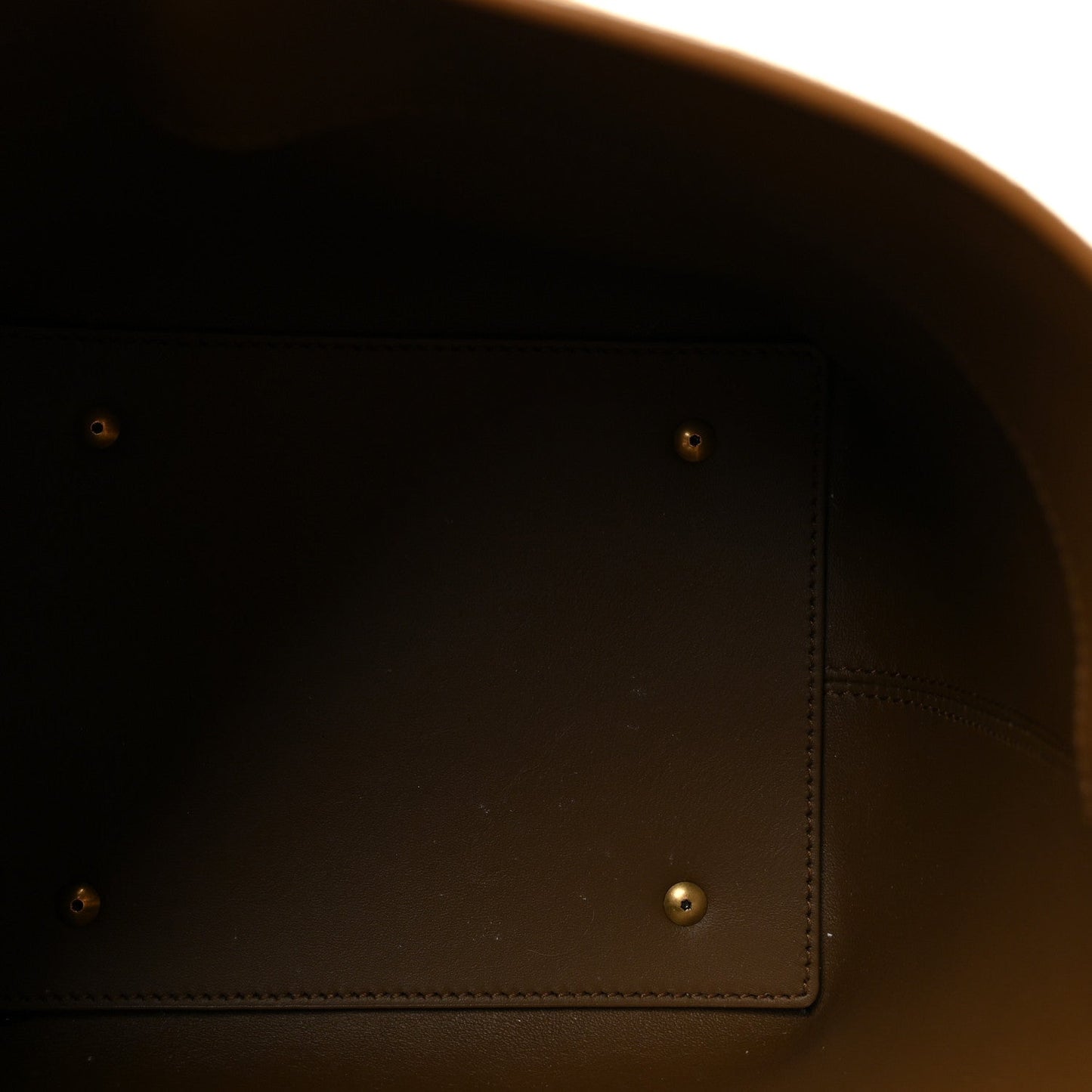 Suede bucket bag interior lining with side compartment and stitching, dark brown