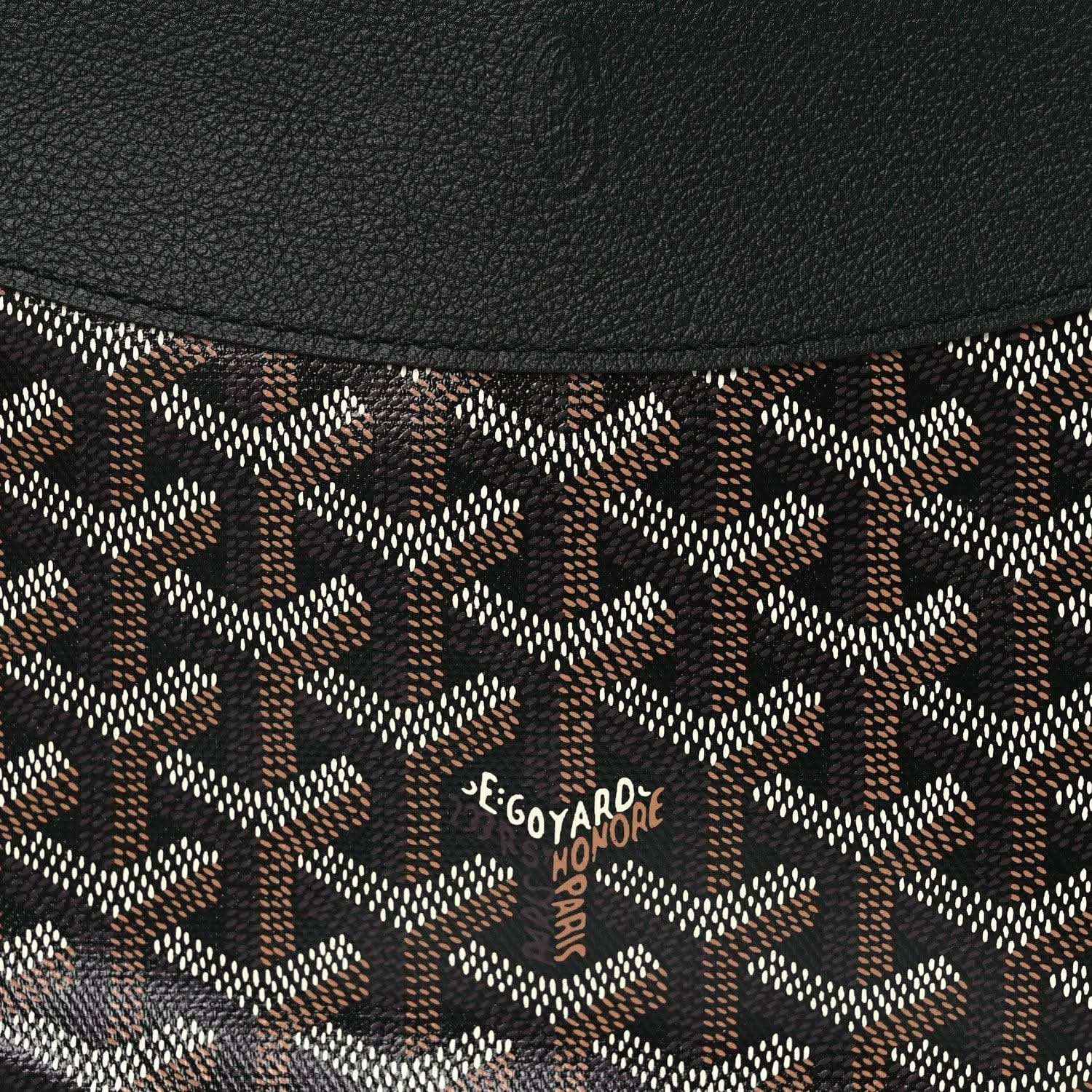 Monogram canvas with black top trim and stitched logo label