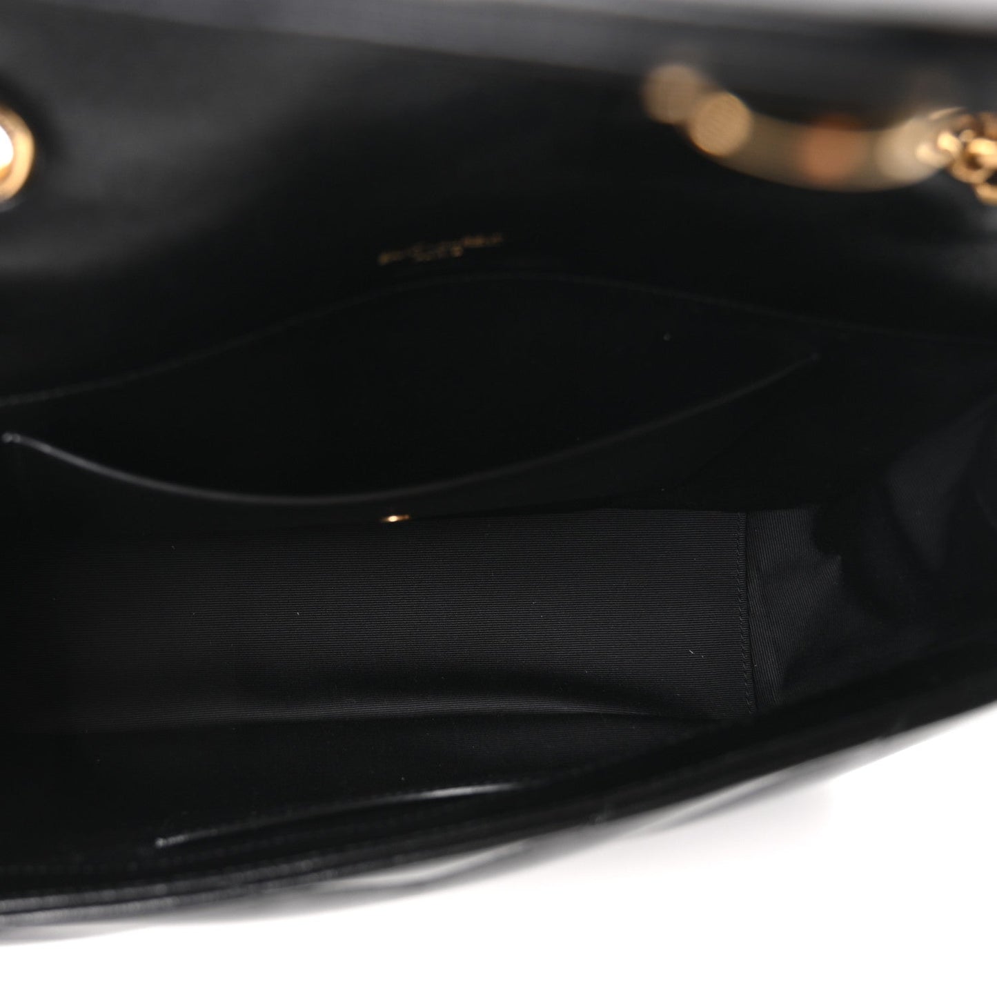 Black leather bag interior with lining and stitched seam