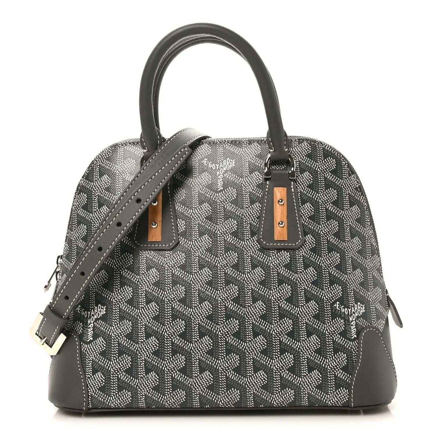 Grey coated canvas chevron handbag with leather handles and brown hardware accents.
