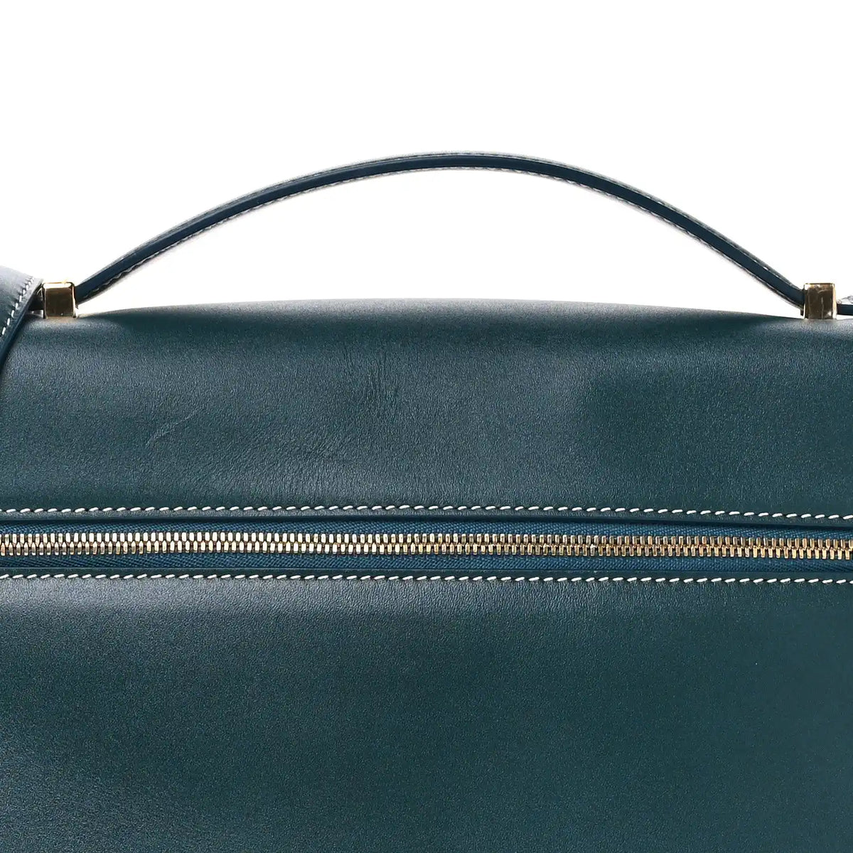 Petrolio teal leather bag top with arched handle and striped zipper trim