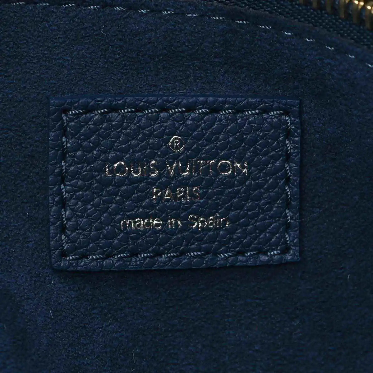Louis Vuitton Paris made in Spain leather label on dark blue monogram tote