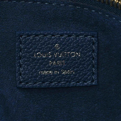 Louis Vuitton Paris made in Spain leather label on dark blue monogram tote