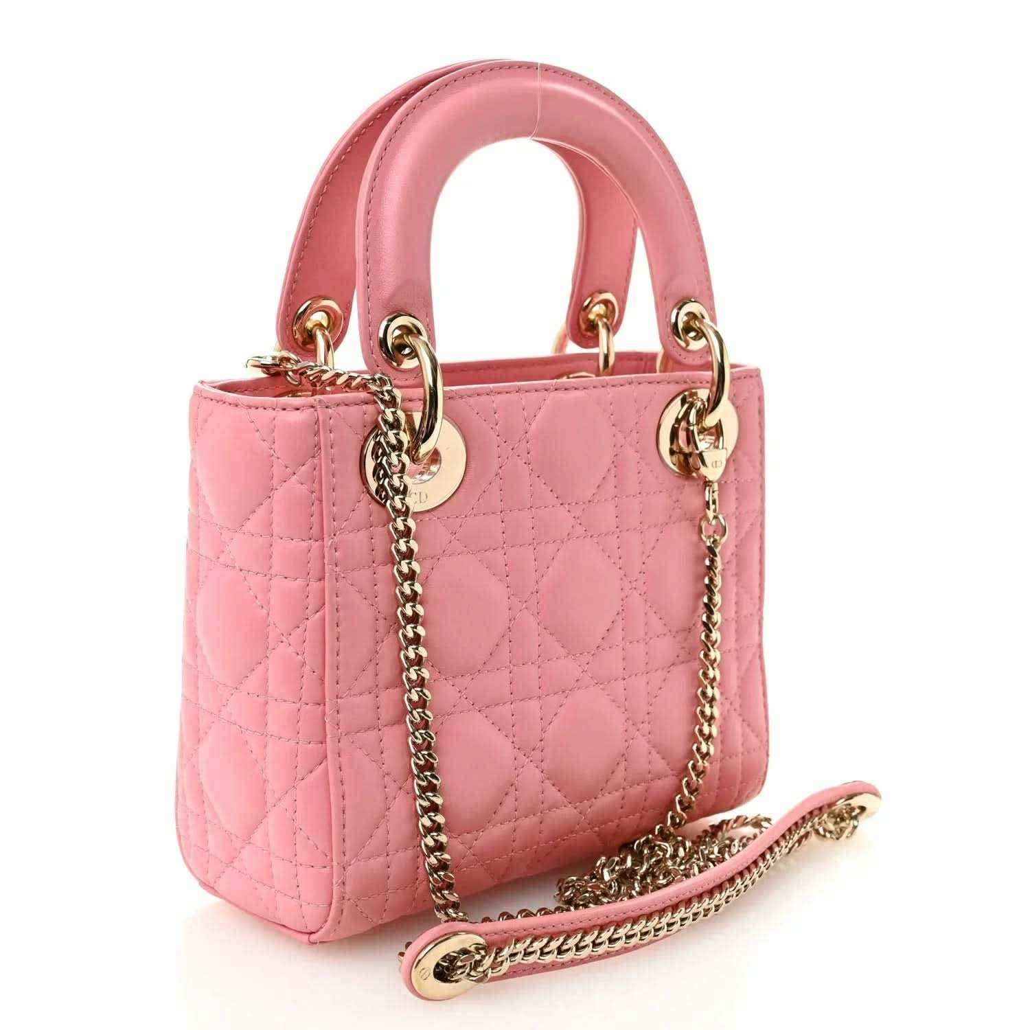 Light pink mini handbag with top handles, quilted Cannage pattern, and gold hardware