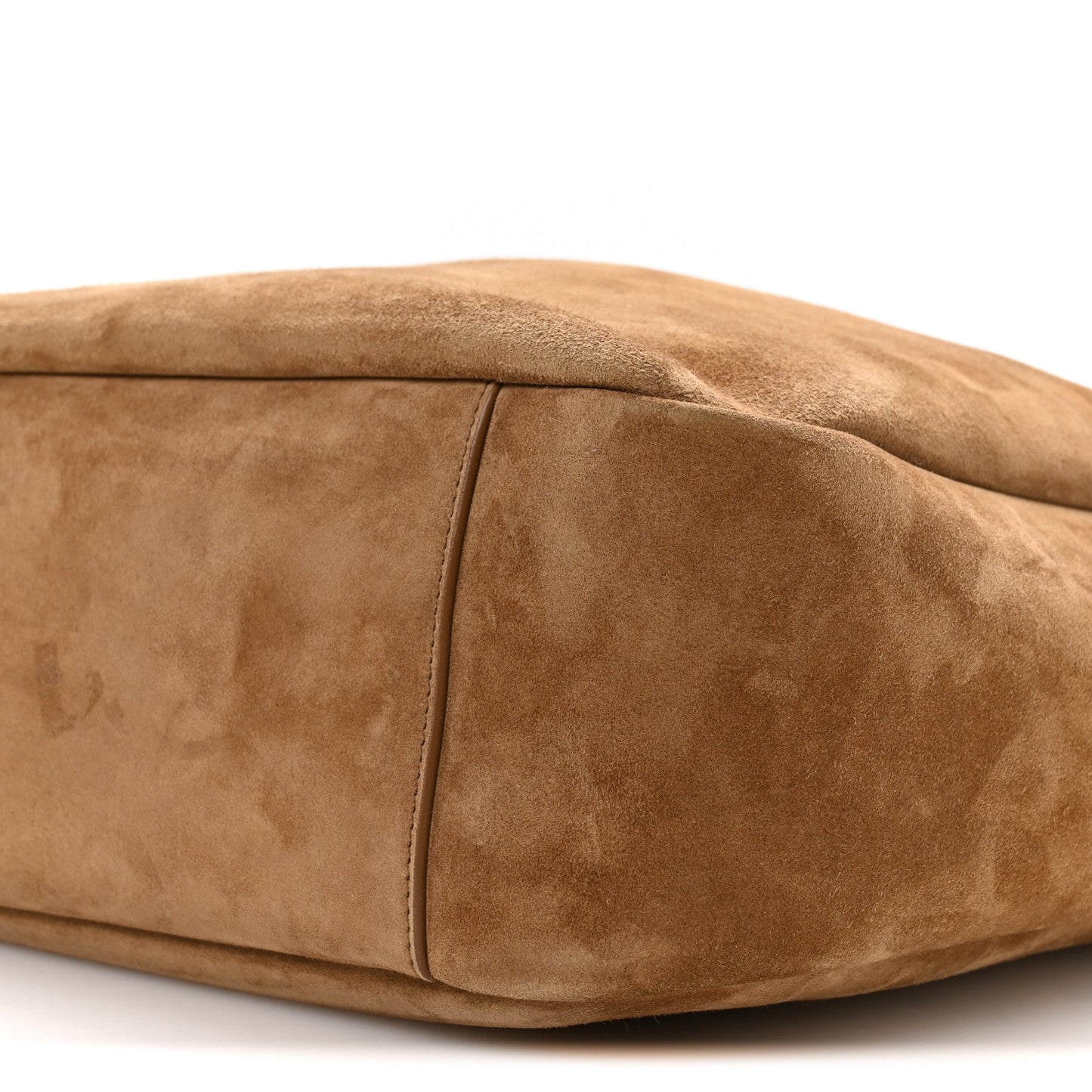 Suede hobo bag side panel close-up, barley tan with central seam line