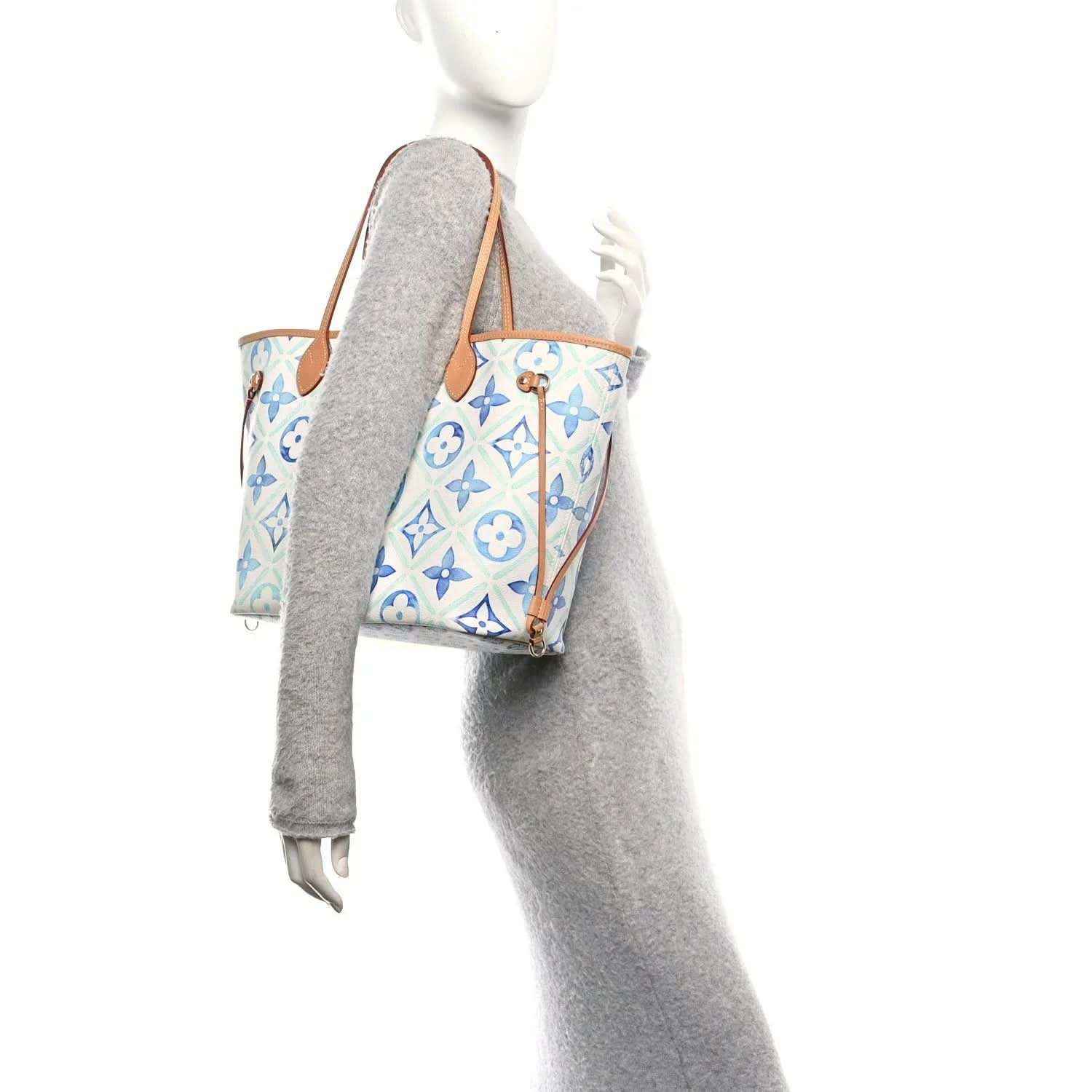 Louis Vuitton Neverfull tote bag in blue monogram print with tan leather straps
