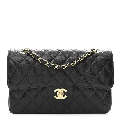 Chanel caviar quilted small double flap bag in black leather, gold CC logo and chain strap