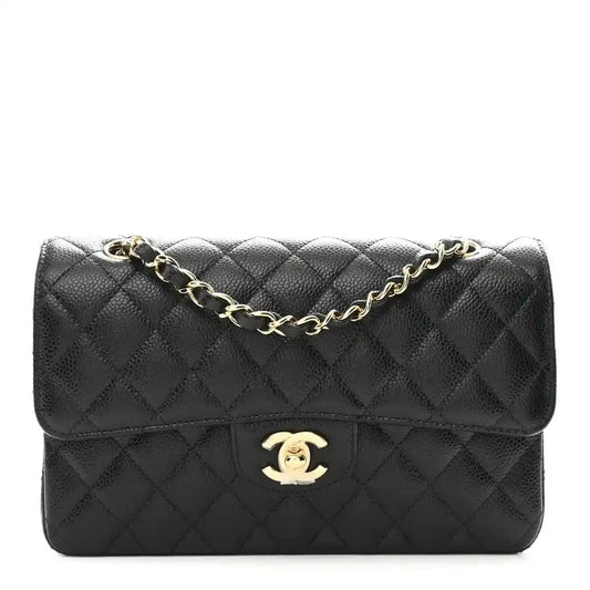 Chanel caviar quilted small double flap bag in black leather, gold CC logo and chain strap