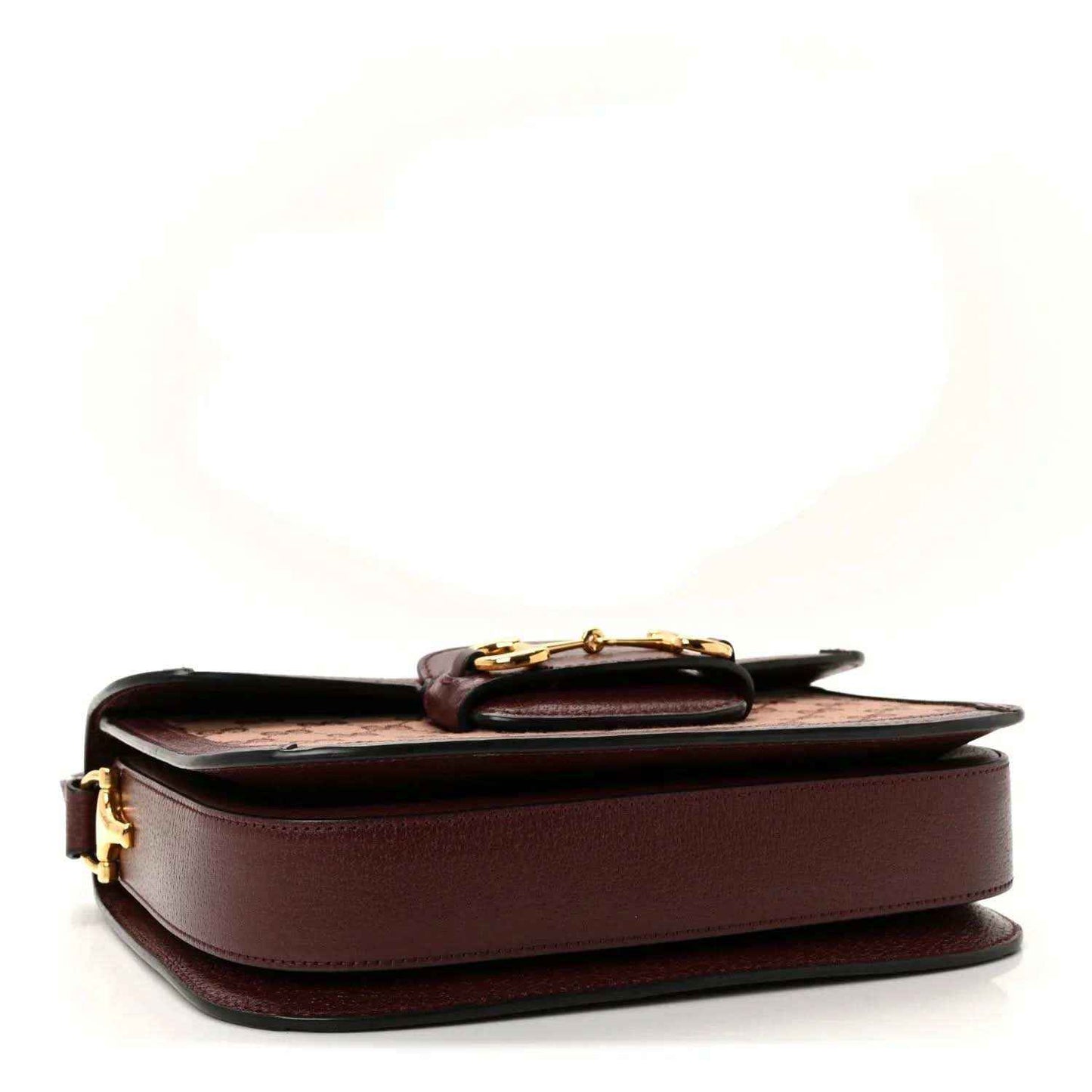 Gucci shoulder bag back view with smooth burgundy leather panel and gold clasp hardware