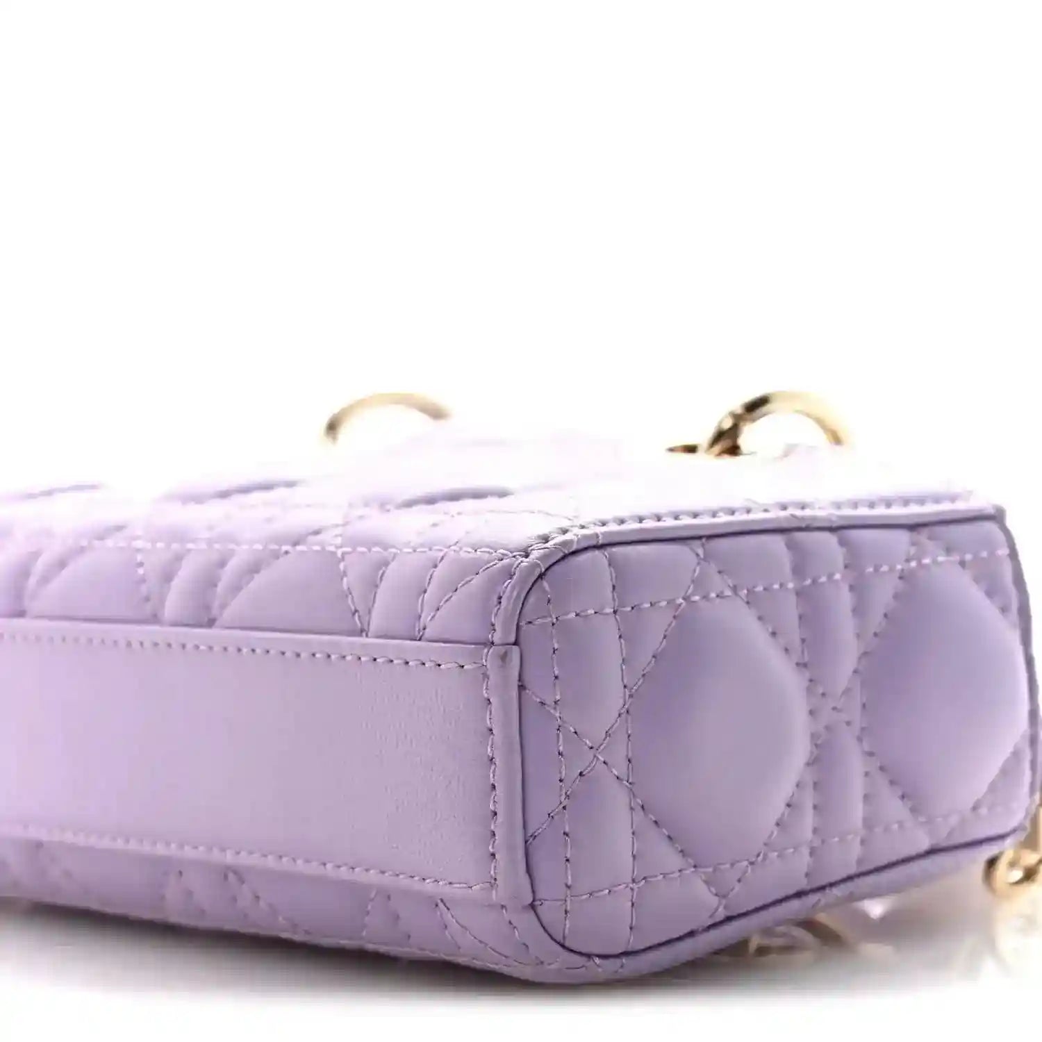 Lilac micro D-Joy bag corner close-up, quilted panels and gold chain strap