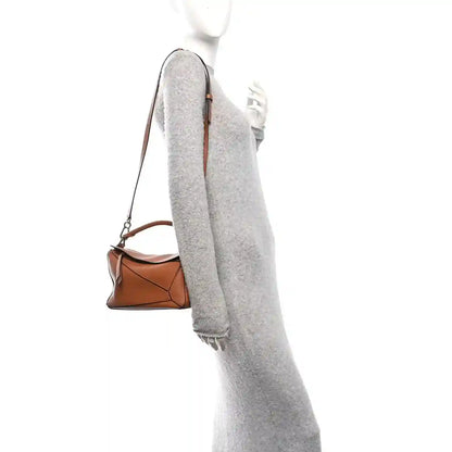 Loewe tan calfskin small Puzzle shoulder bag worn on crossbody strap