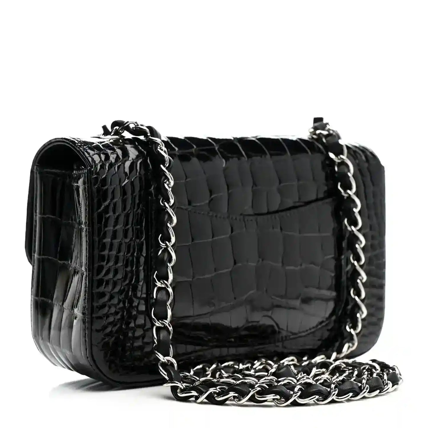 Black shiny alligator mini rectangular flap bag with silver-tone chain strap.