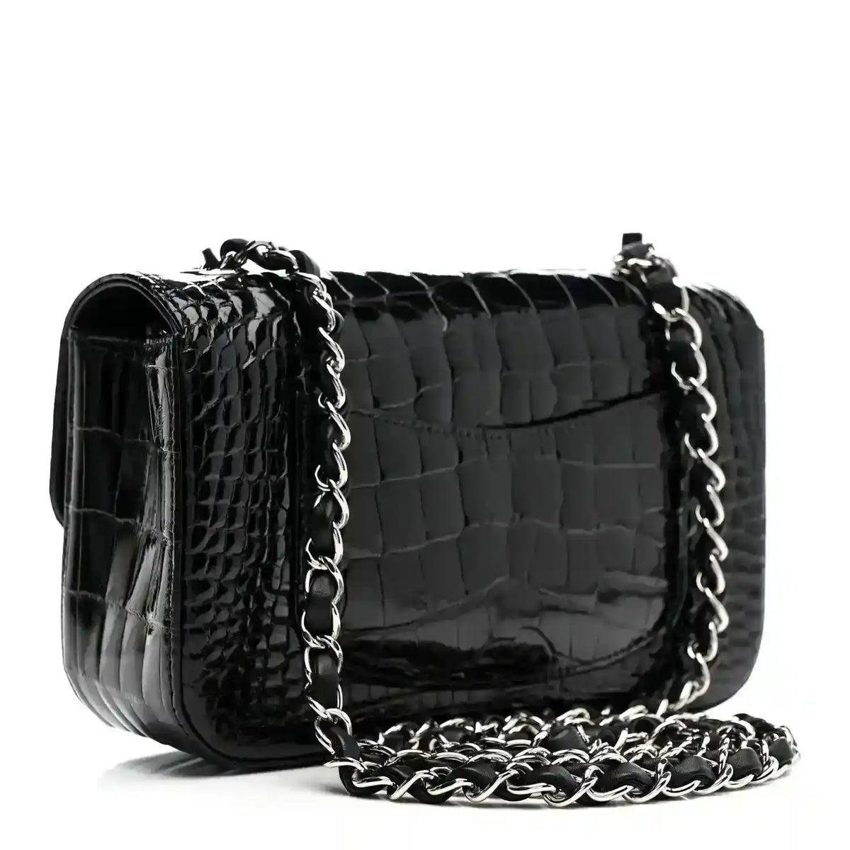 Black shiny alligator mini rectangular flap bag with silver-tone chain strap.