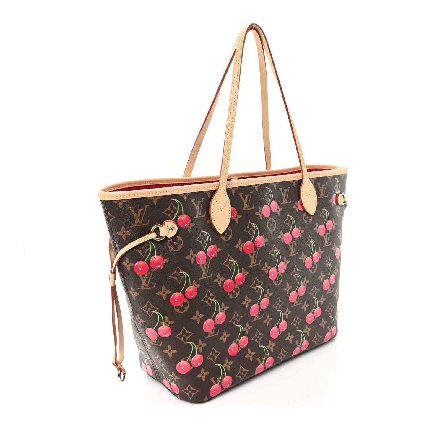 Cherry-print monogram tote bag with tan leather handles and zipper pull tabs.