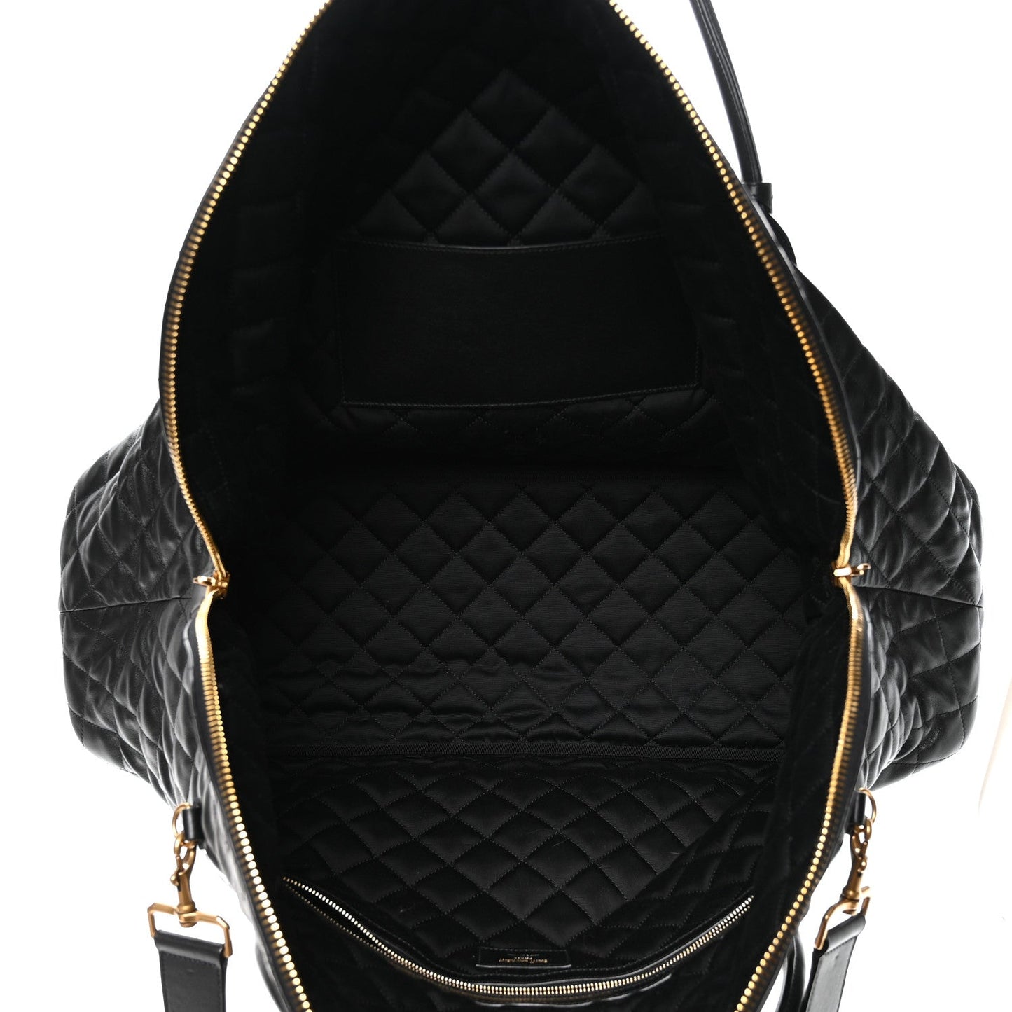 Black quilted leather interior with zippered opening and gold-tone zipper pulls