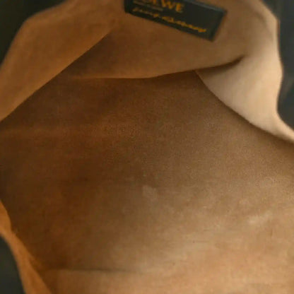 Nappa calfskin clutch interior with small Loewe label, showing “LOEWE” text