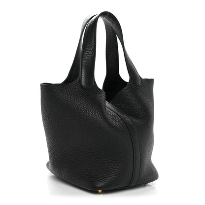 Black textured leather hobo tote with side seam and gold base detail