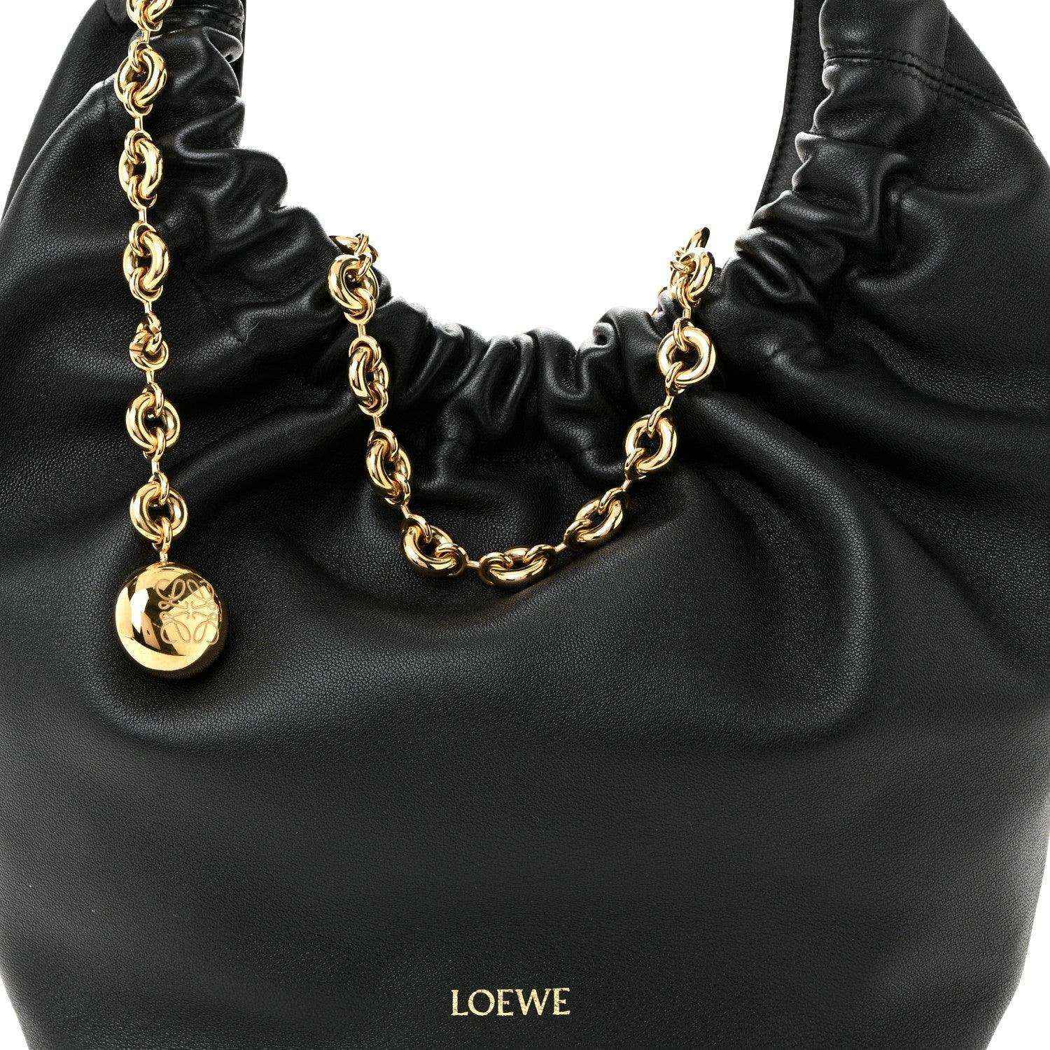 Loewe small squeeze bag in black ruched nappa leather with gold chain and LOEWE charm