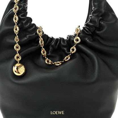 Loewe small squeeze bag in black ruched nappa leather with gold chain and LOEWE charm