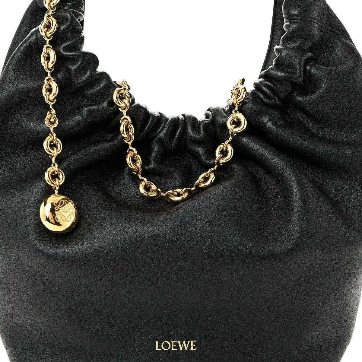 Loewe small squeeze bag in black ruched nappa leather with gold chain and LOEWE charm