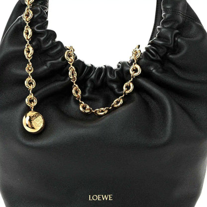 Loewe small squeeze bag in black ruched nappa leather with gold chain and LOEWE charm