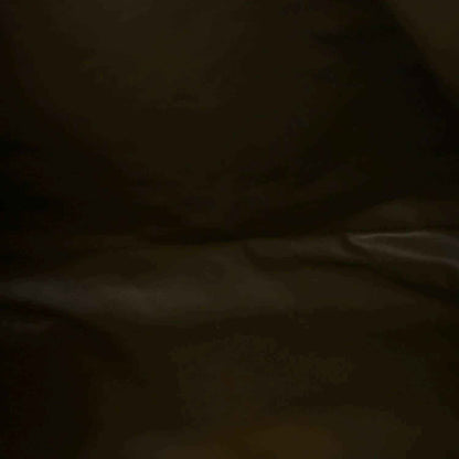 Suede lining area of a mud green hobo bag
