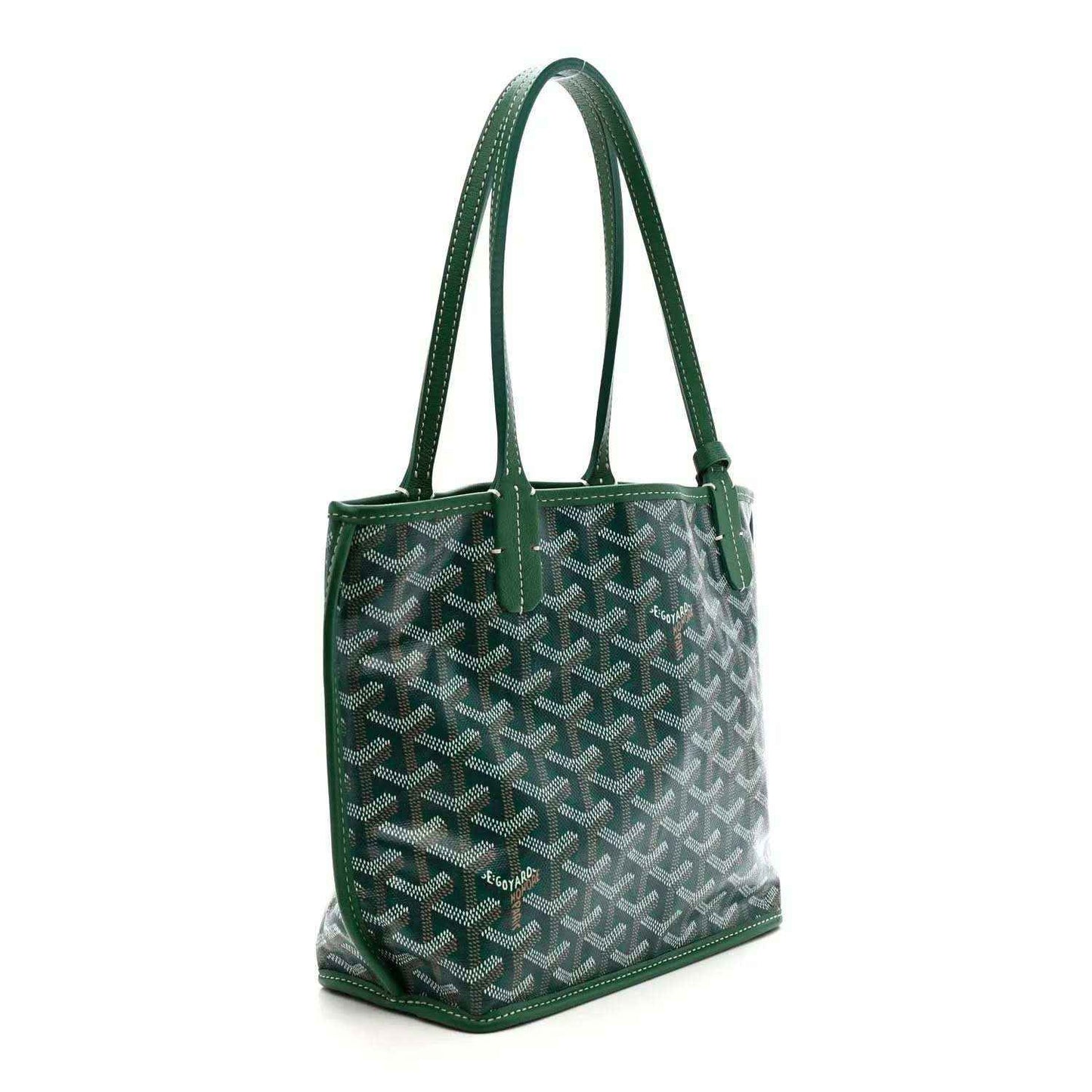 Green reversible mini tote bag with patterned exterior and top handles