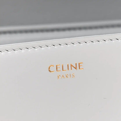 Shiny calfskin flap with CELINE PARIS embossed logo