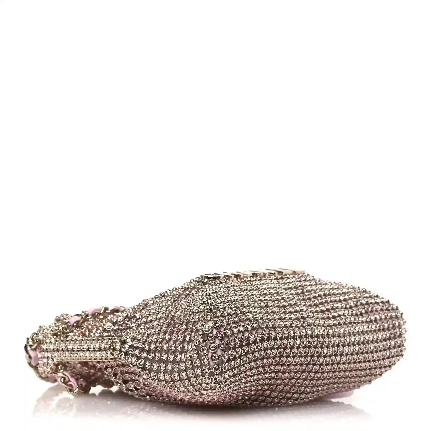 Chanel Mini 22 handbag, rounded side view with pink metallic crystal mesh exterior.