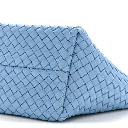 Blue intrecciato woven mini cabat tote with stitched seam detail on side panel