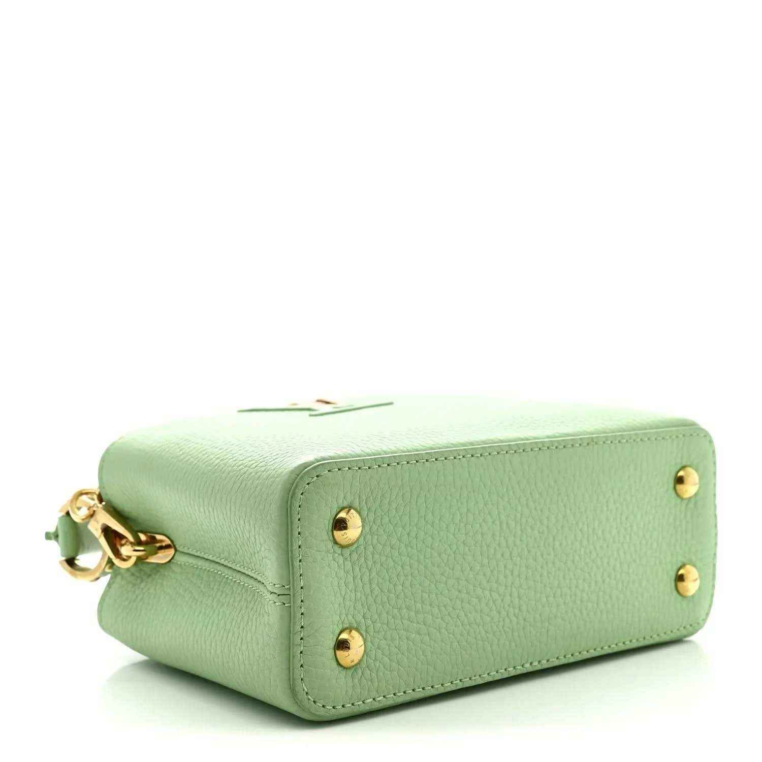 Louis Vuitton mini Capucines leather handbag, vert pomme green, side view with gold studs