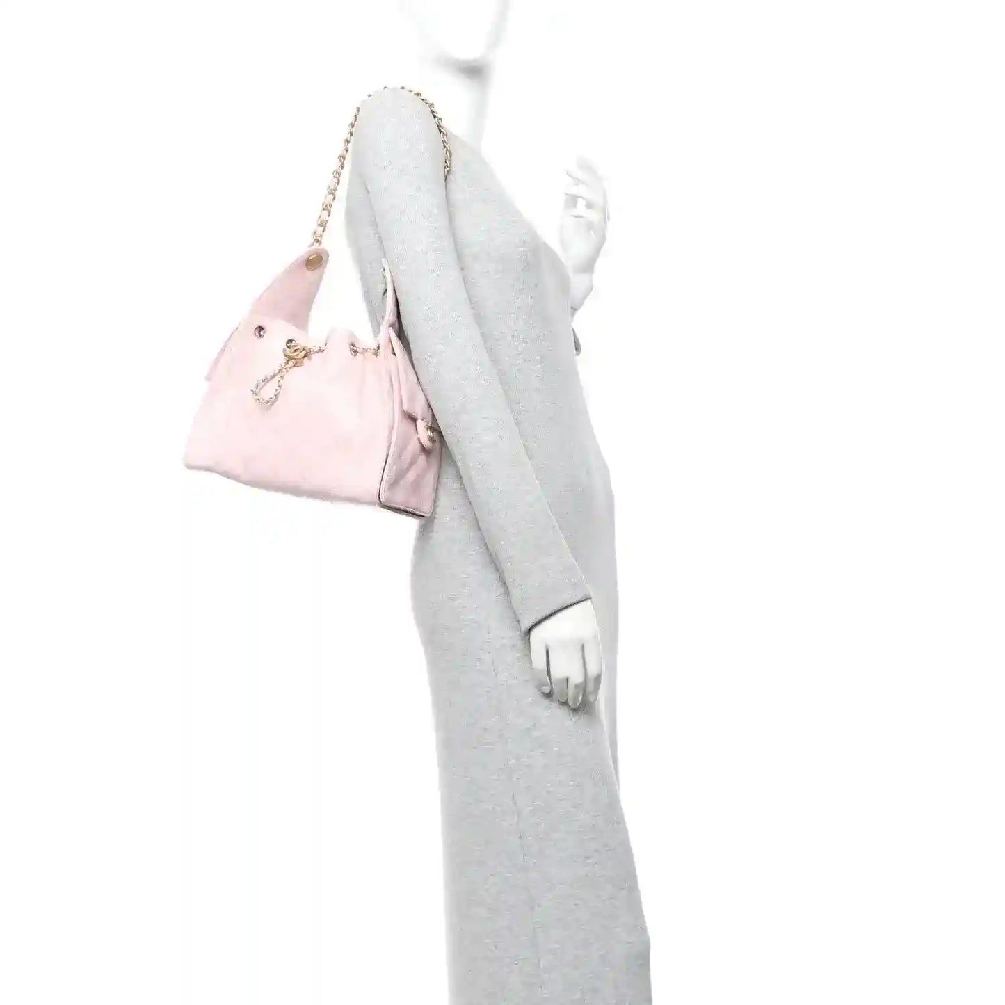 Chanel light pink quilted caviar small shoulder handbag worn on shoulder