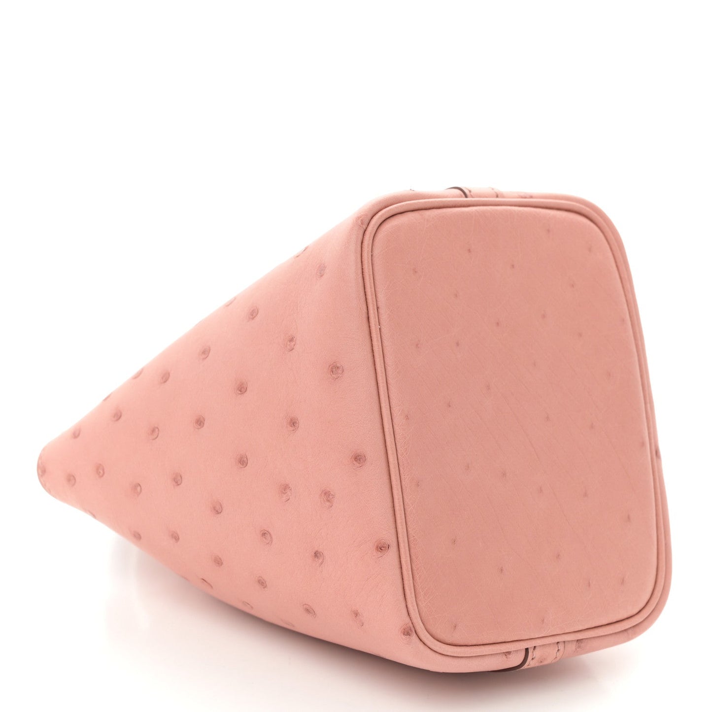 Light pink ostrich leather mini bucket bag with rounded side and fabric-lined top