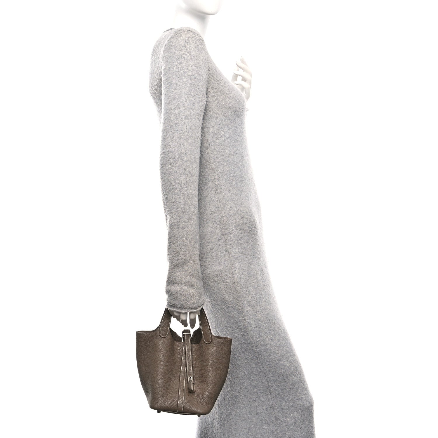 Taupe leather tote bag, side profile with top handles and lock closure
