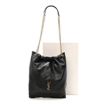 Black quilted leather drawstring bag with gold chain and YSL monogram
