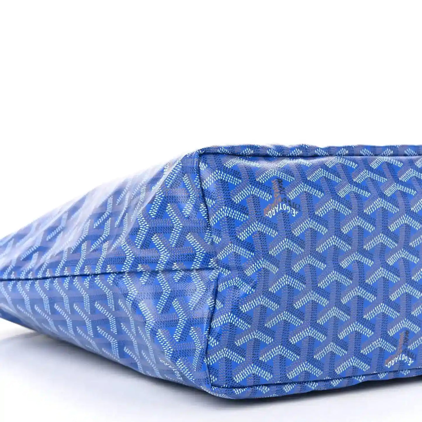 Sky blue tote bag with pleated corner detail and allover Goyardine pattern, end view
