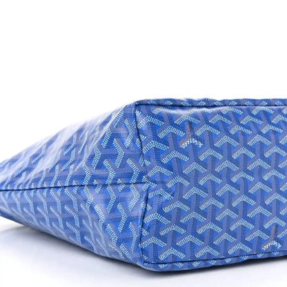 Sky blue tote bag with pleated corner detail and allover Goyardine pattern, end view