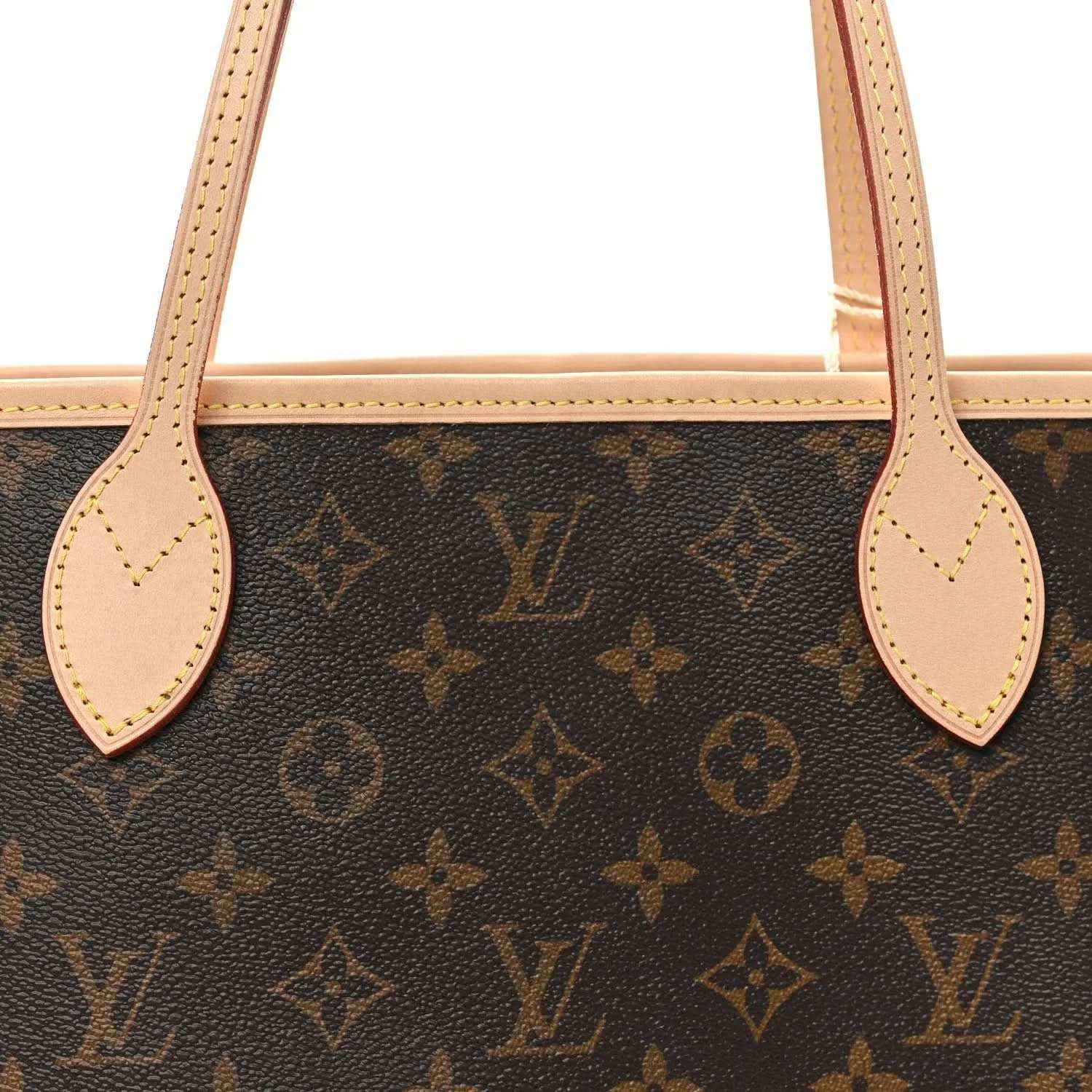 Louis Vuitton monogram canvas tote with vachetta leather handle tabs and perforated straps