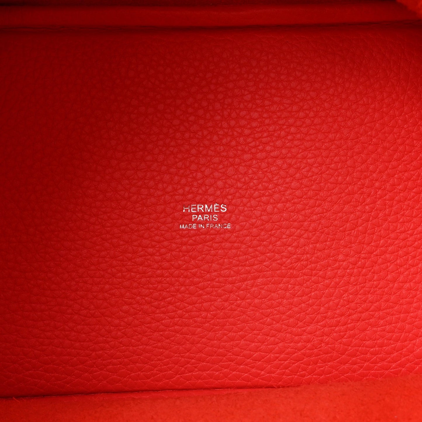 Red leather tote with embossed HERMES PARIS and MADE IN FRANCE stamp