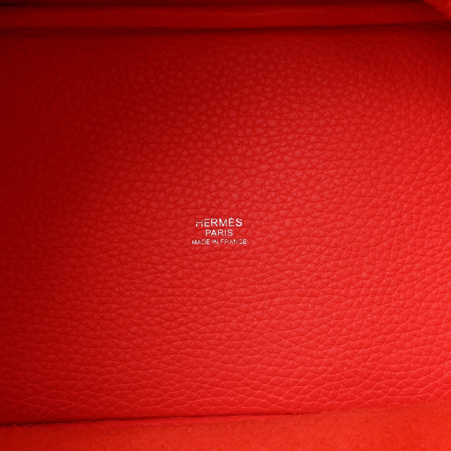 Red leather tote with embossed HERMES PARIS and MADE IN FRANCE stamp