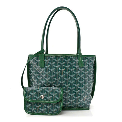 Green patterned mini tote bag with front flap pocket, top handles, and snap closure