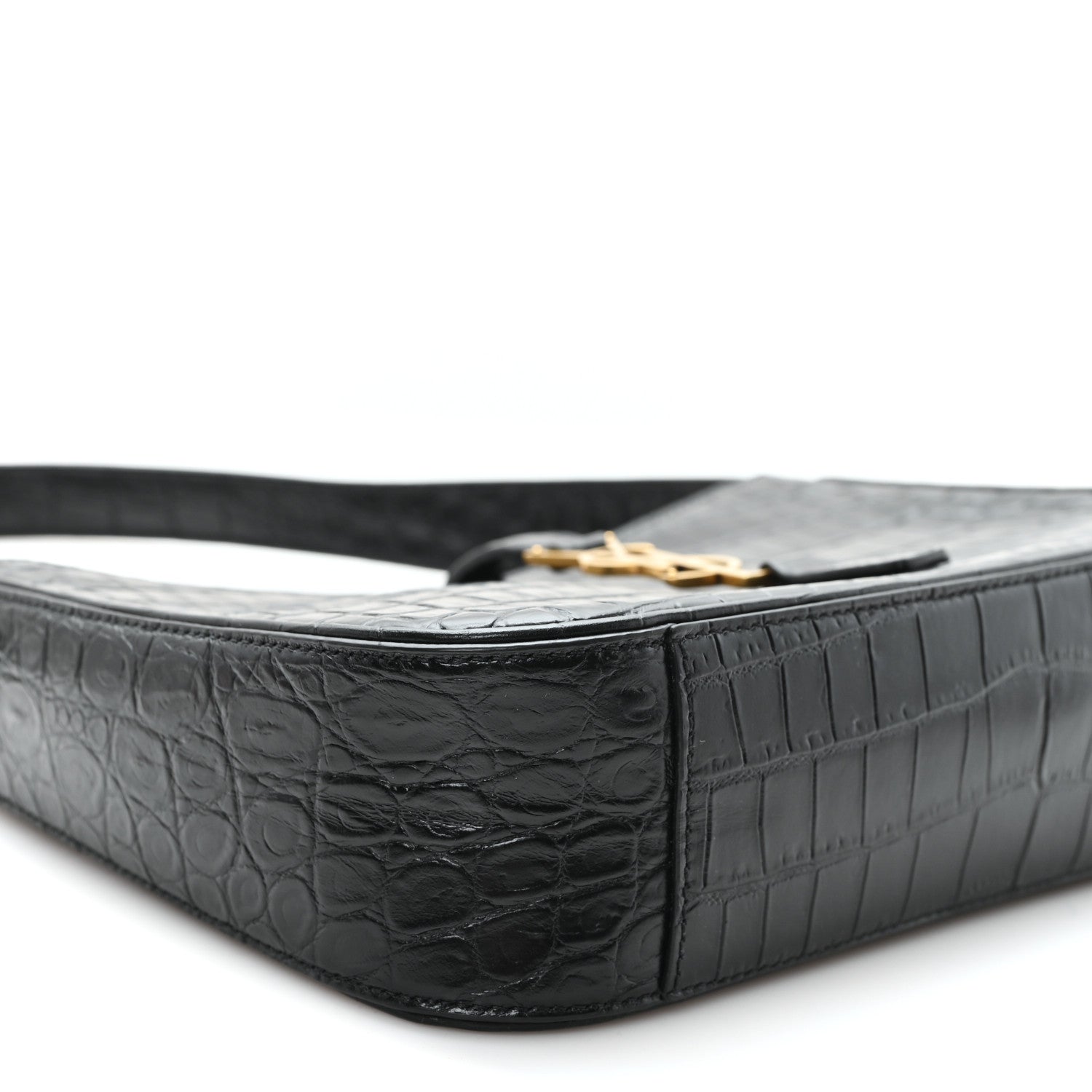 Black embossed calfskin hobo bag close-up of side panel and top edge