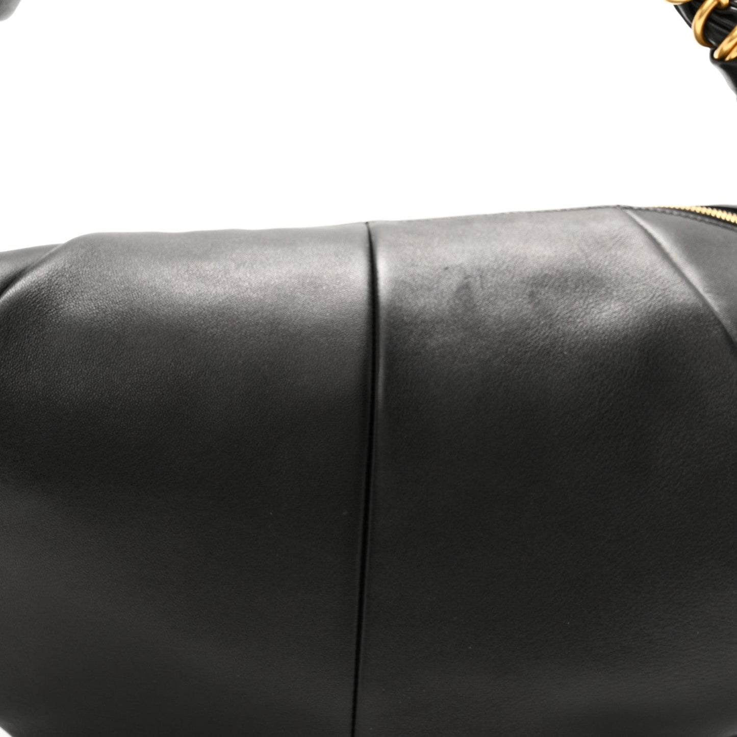 Black lambskin hobo bag side panel seam detail