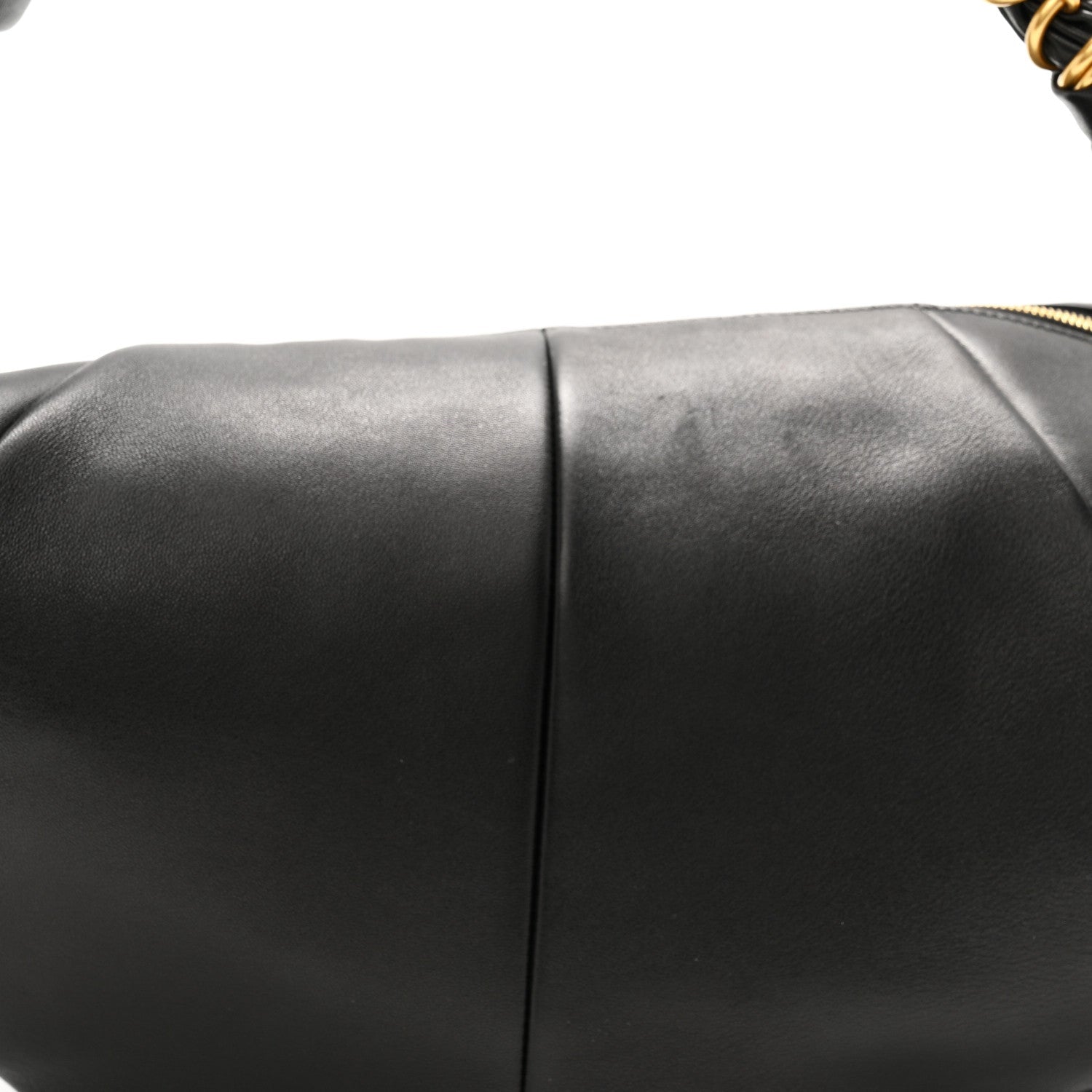 Black lambskin hobo bag side panel seam detail