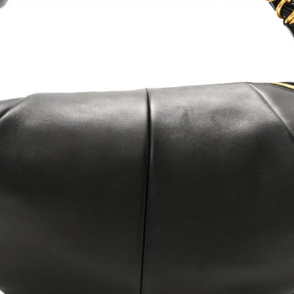 Black lambskin hobo bag side panel seam detail