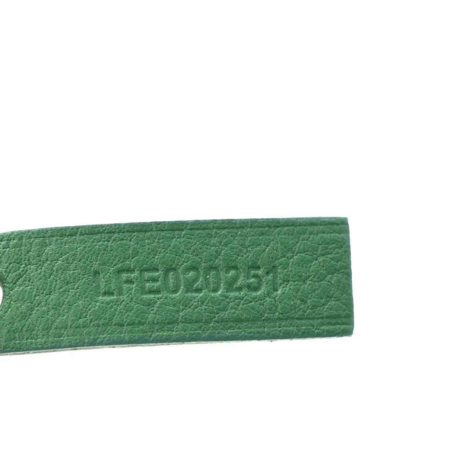 Green leather strap with embossed text band