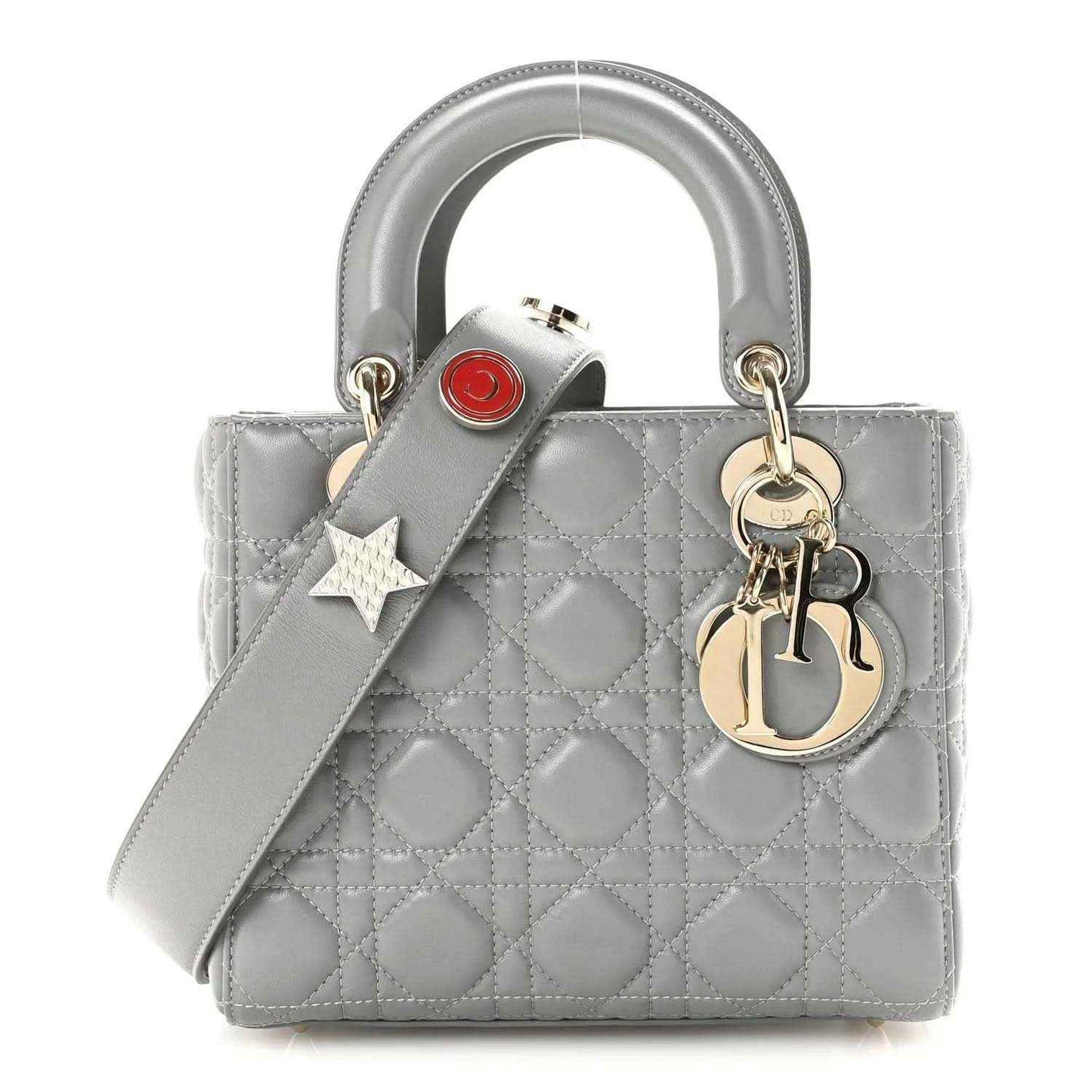 Grey quilted Lady Dior handbag with top handles, star charm, and keyring detail