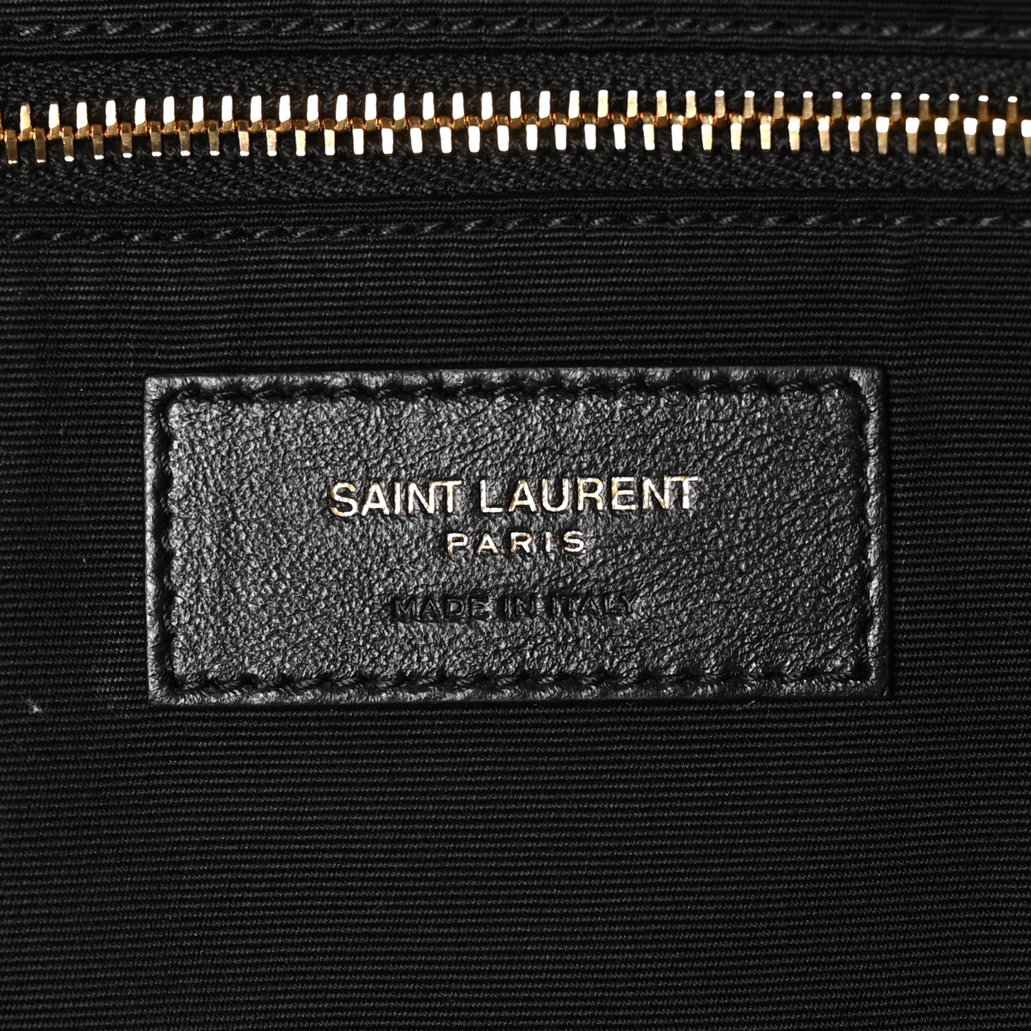 Saint Laurent Paris leather brand patch with zipper at top edge