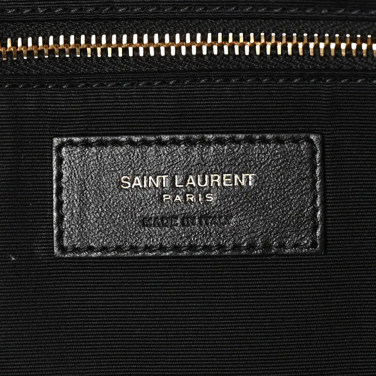 Saint Laurent Paris leather brand patch with zipper at top edge