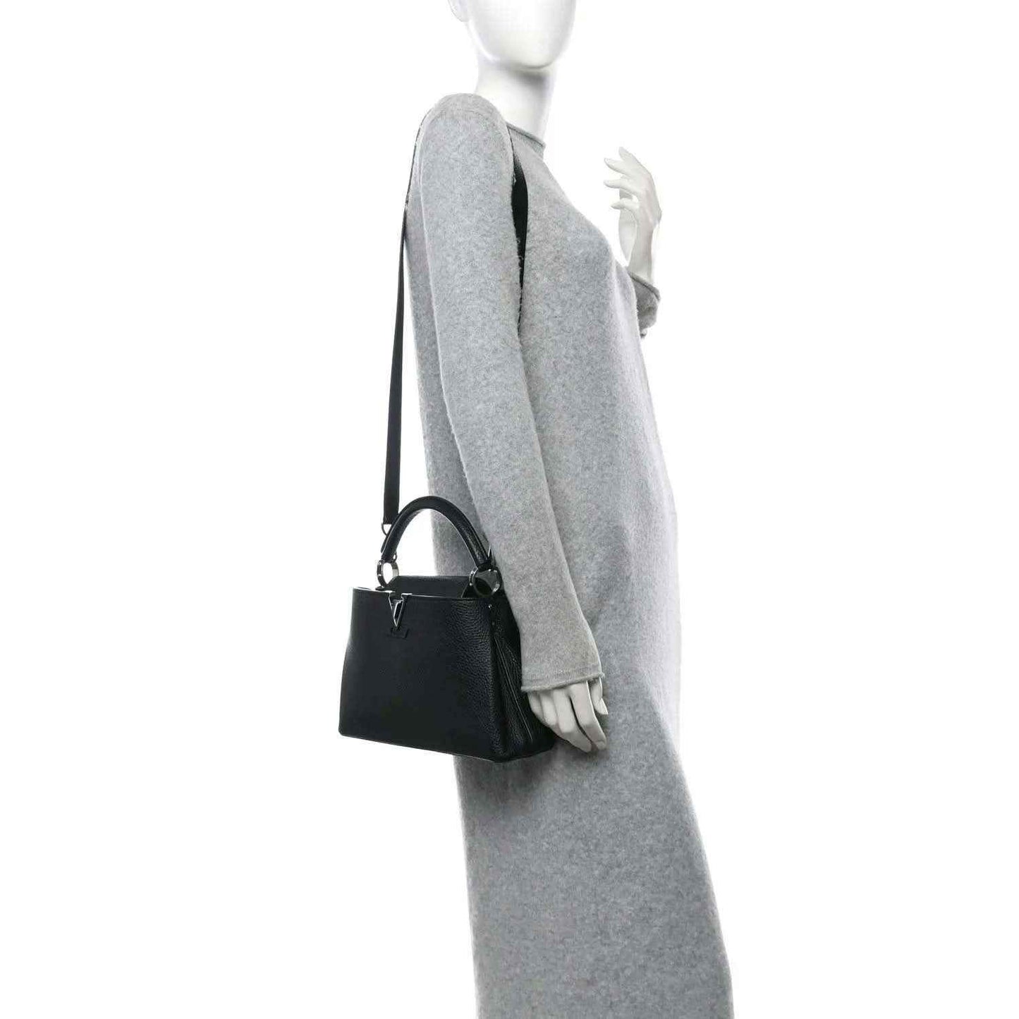 Black leather mini handbag with short handles and side strap